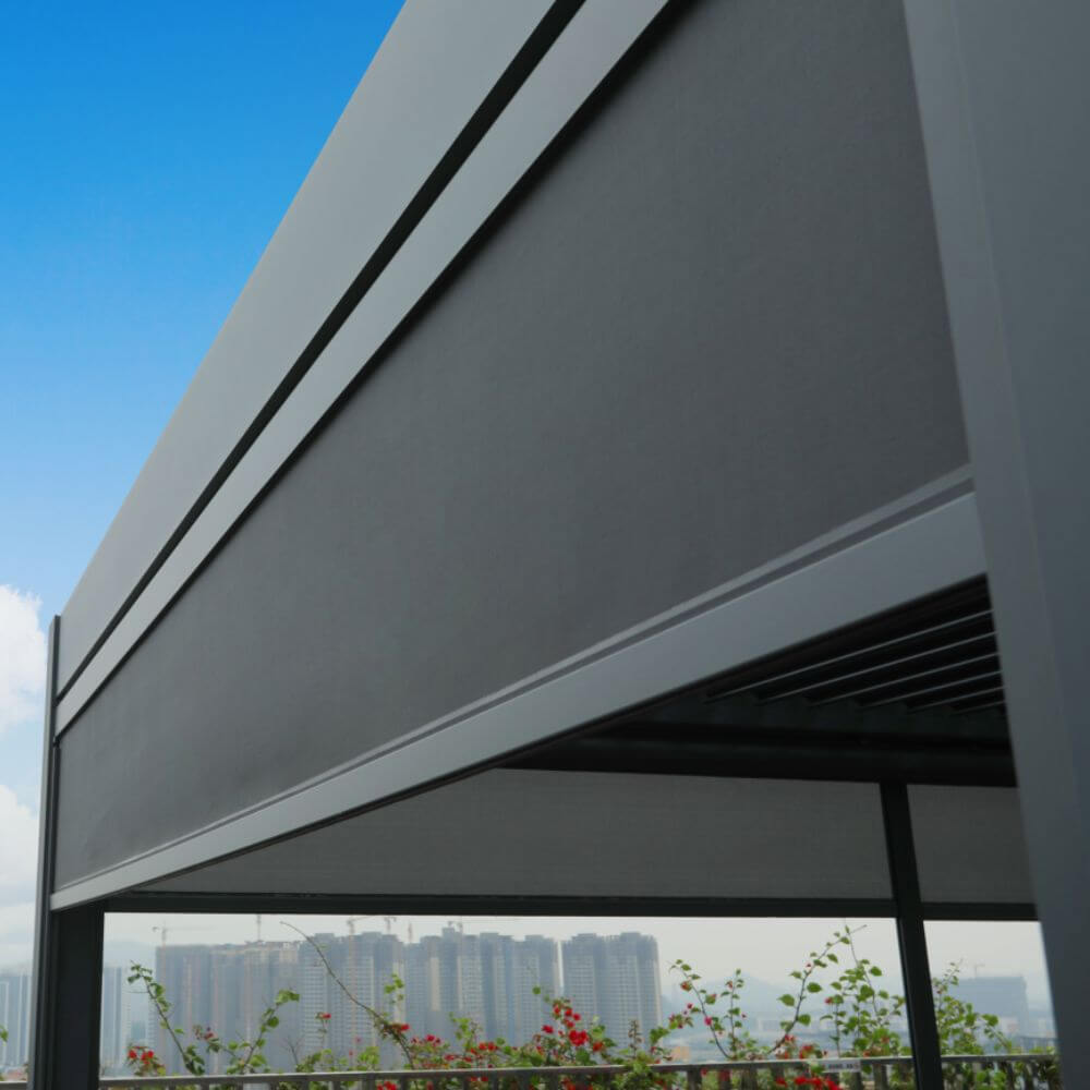 The dark gray screens are part of the Bon Pergola Wind Resistant Screen - Weatherproof Pergola. These windproof screens effectively block strong winds while providing shade and privacy, making the outdoor space more comfortable.