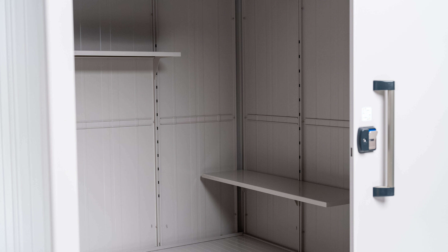 The YODOKO Premium Outdoor Large Shed LMDS by BON PERGOLA features a metal cabinet with two shelves, showcasing elegant Japanese craftsmanship. Its door is partially open with a black handle and lock on the right side, revealing its sturdy interior and durable coating.