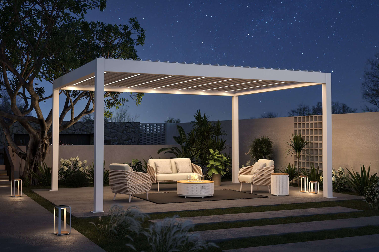 The white BON PERGOLA has its louvered top open. The design is sleek and modern, with white columns and beams. Beneath it, you'll find a beige and light brown outdoor lounge set, including a loveseat, two single woven armchairs, and a woven ottoman. In the center of the seating area is a white round coffee table, featuring a gas fire pit in the middle, surrounded by a transparent glass wind guard. Underneath the coffee table is a deep gray rug.
