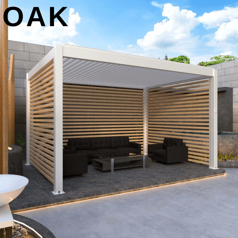 The white Bon Pergola features white louvered slats with a wood-like texture, though made of aluminum. The white pergola structure contrasts with the wood slats and deep gray furniture, creating a stylish and private outdoor retreat.