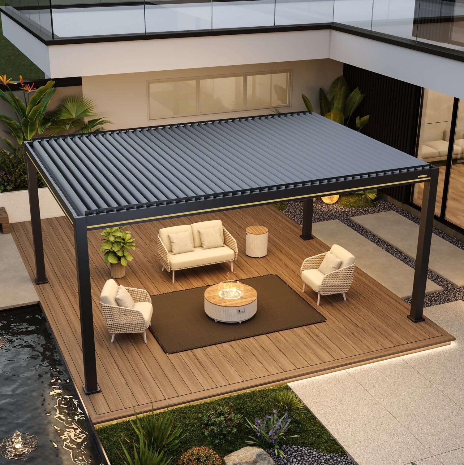 An overhead rendering of an outdoor lounge area featuring a black electric louvered pergola. Below, there’s a set of light beige outdoor lounge furniture, including a two-seat sofa and two beige woven armchairs, all with light-colored cushions. In the center of the seating area, there’s a round coffee table with a gas fire pit in the middle, surrounded by a transparent glass wind guard.