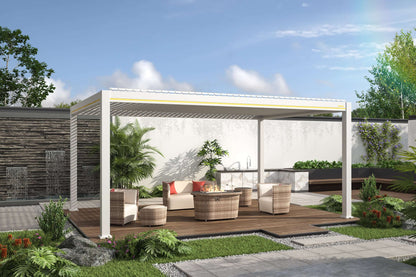 This is a white pergola with an adjustable louvered roof (currently closed). The structure is simple, made up of white columns and beams. Beneath the pergola is a set of light beige outdoor lounge furniture, including a two-person sofa and two woven armchairs. In the center of the seating area is a woven coffee table with a gas fire pit built into the top.