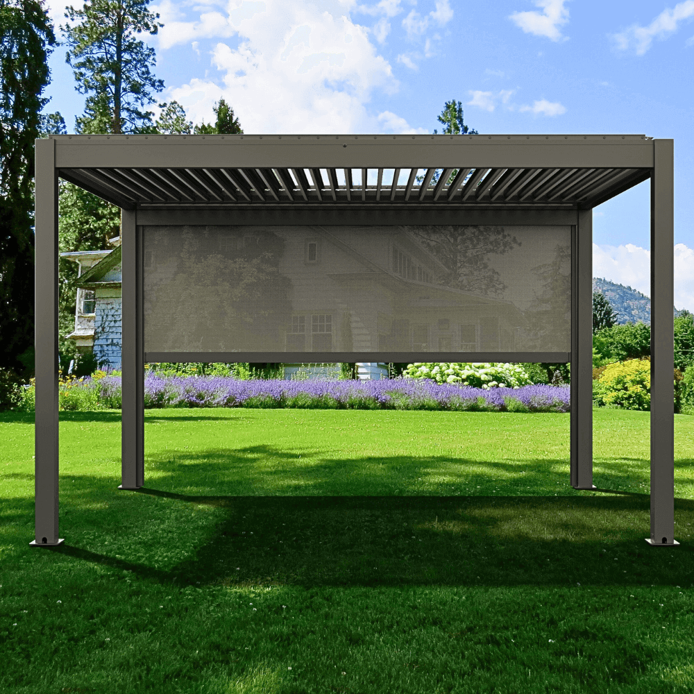 The dark gray Bon Pergola features partially open louvers, casting sleek, linear shadows below. Its structure is made up of sturdy dark gray beams and columns in a clean, modern design. One side is fitted with a light gray shade screen, partially lowered to offer soft shade and added privacy.