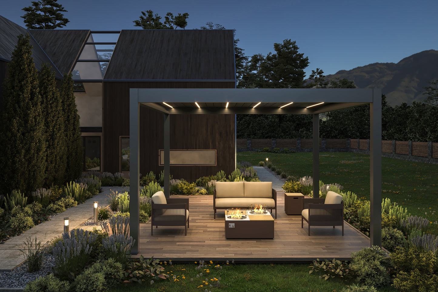 A dark gray pergola with partially opened louvers reveals integrated warm yellow LED lighting glowing softly between the slats. Beneath, a platform with light brown wooden decking hosts a modern outdoor lounge setup, featuring a beige sofa, two dark gray armchairs, and a square coffee table. At the center of the table, a square fire pit is lit, adding a cozy, inviting touch to the space.