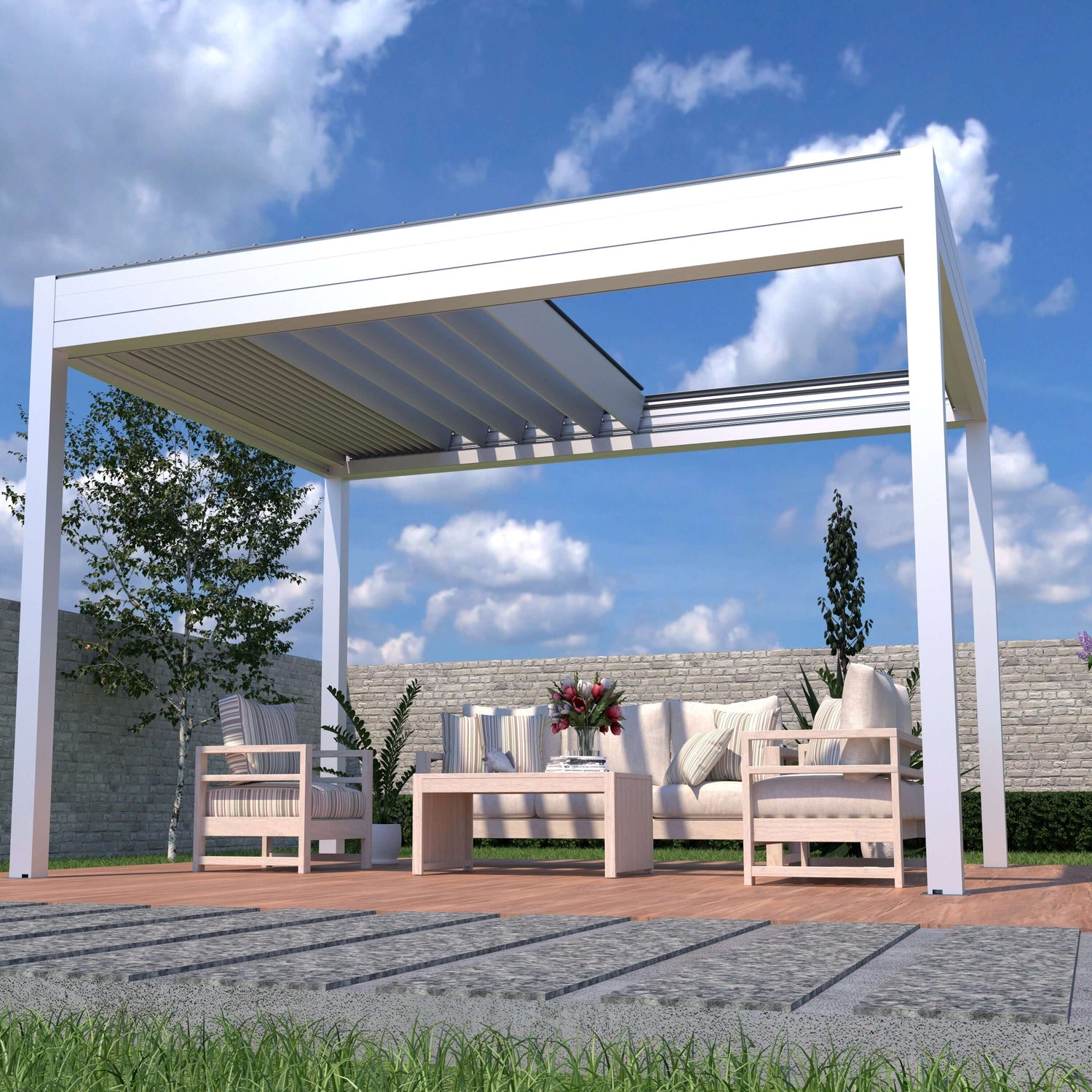 The white pergola The white pergola has its shade partially retracted, showing white beams and light gray louvers. It features sturdy white posts and beams with a modern design. Below, a set of beige outdoor furniture includes a long sofa, two armchairs, and a rectangular coffee table with flowers, books, and decor. The sofa and chairs have striped and solid cushions. The pergola is surrounded by green plants and trees, with a light-colored fence in the background.
