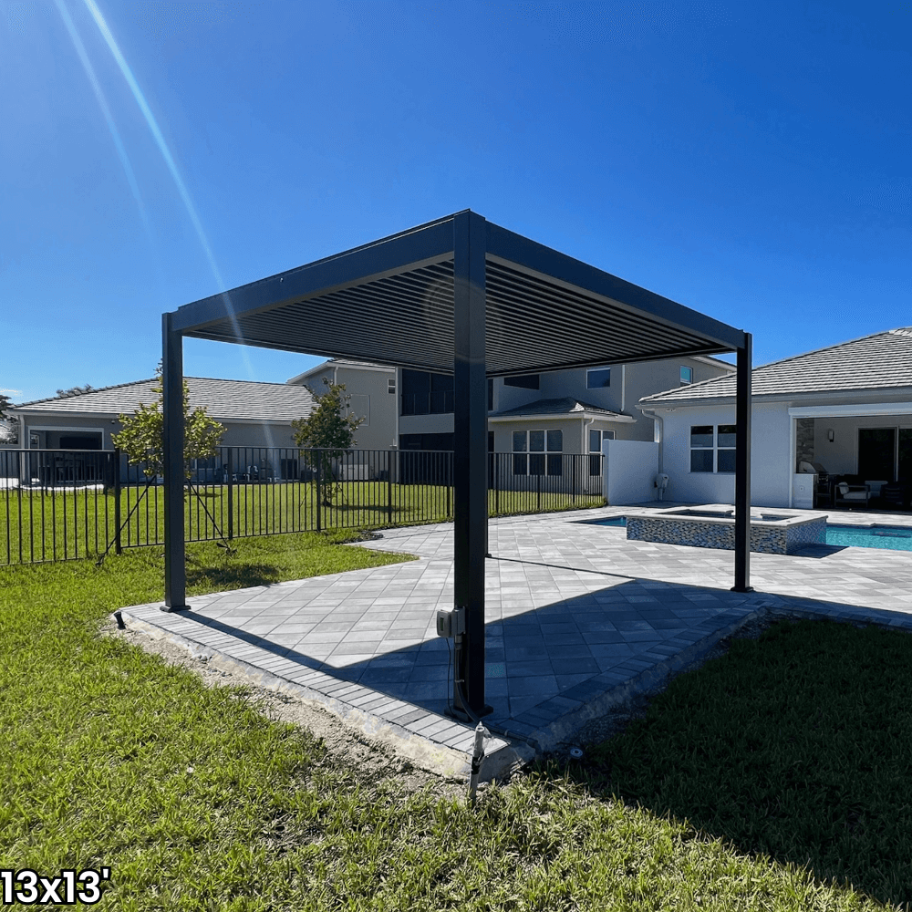 A dark gray aluminum pergola with a motorized louvered roof and LED lighting. Perfect for shade, sun protection, and outdoor gatherings.