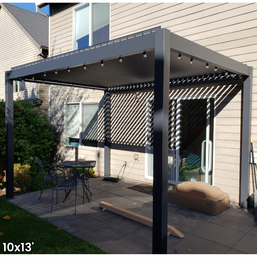 A dark gray aluminum pergola with a motorized louvered roof and LED lighting. Perfect for shade, sun protection, and outdoor gatherings.