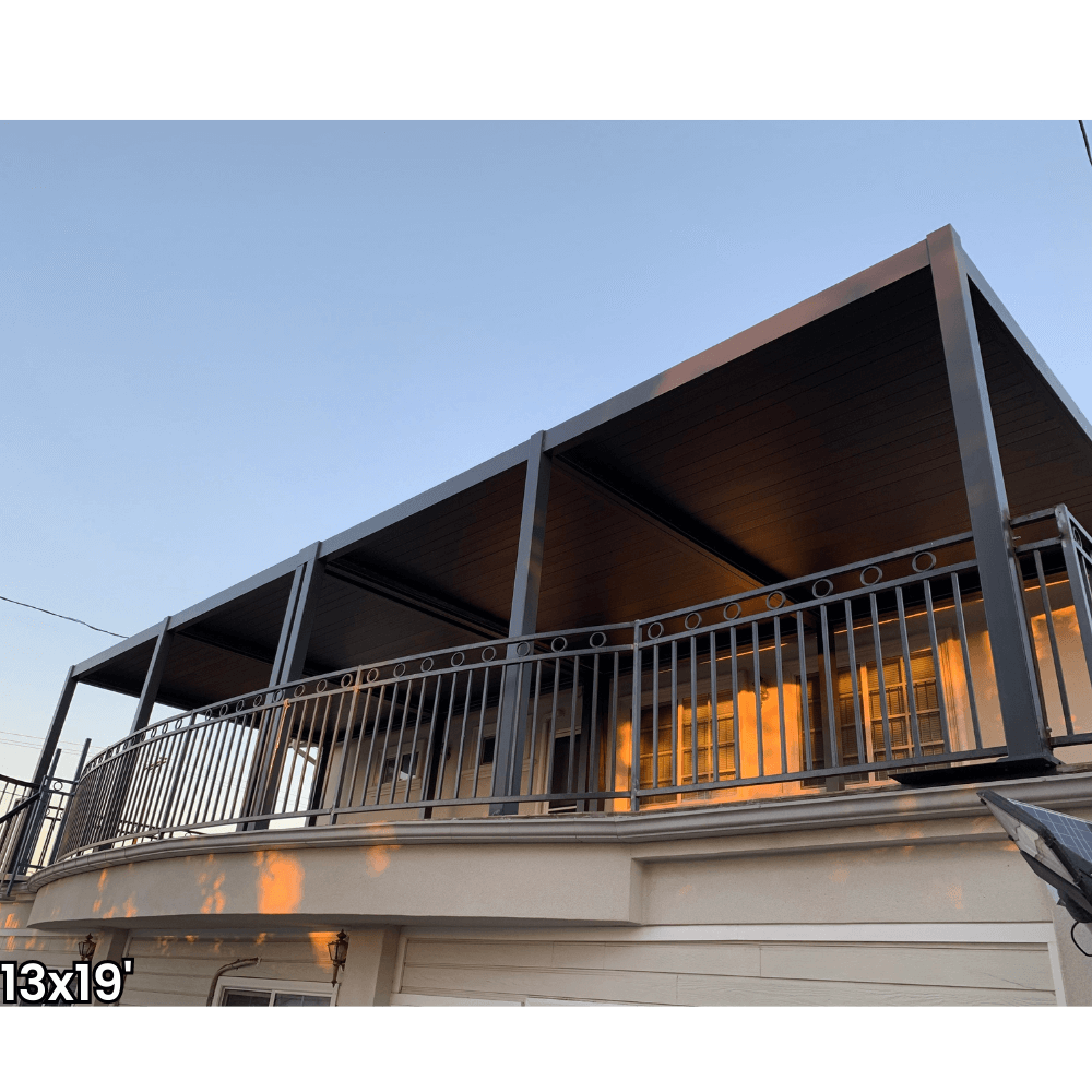 A dark gray aluminum pergola with a motorized louvered roof and LED lighting. Perfect for shade, sun protection, and outdoor gatherings.